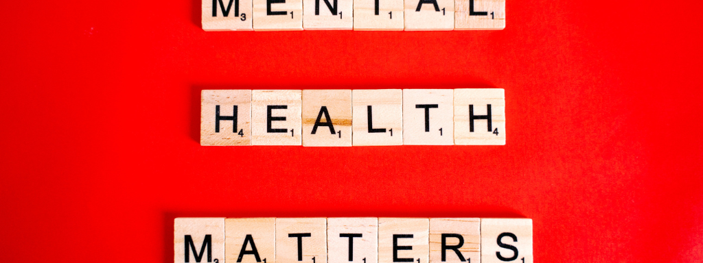 manage intrusive thoughts new parent - the image shows Scrabble tiles spelling out the phrase 'Mental Health Matters'