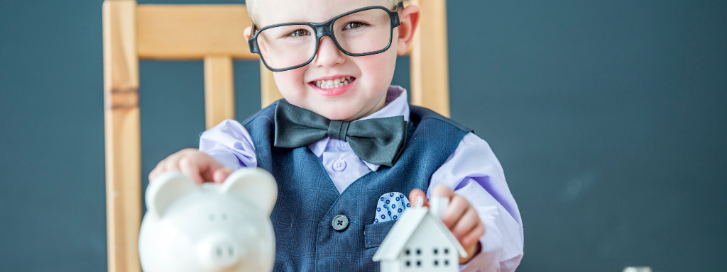 new parent perks and activities - the photo shows a child with a piggy bank