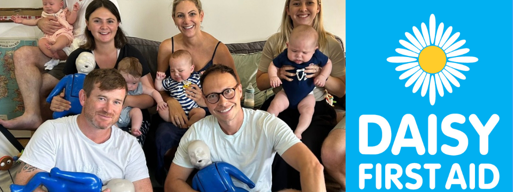 Baby First Aid classes by Daisy First Aid
- photograph shows parents holding their babies and CPR baby dolls