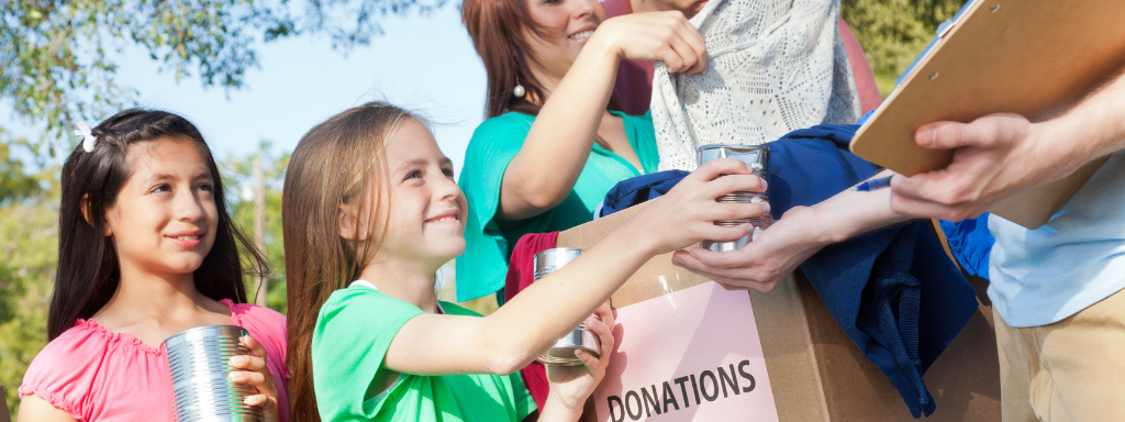 Clear Out Child's Old Clothes - the photo two children donating clothes